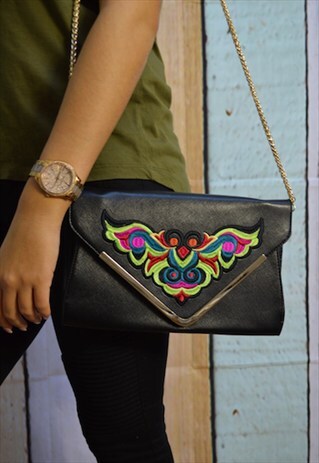 black embroidered clutch bag