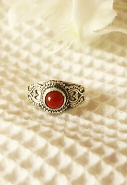 Sterling Silver Ring with Embedded Red Garnet Gemstone