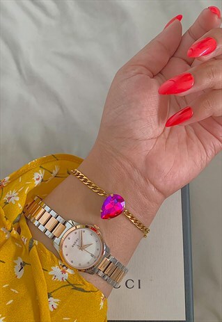 MAJESTY. HOT PINK TEARDROP CRYSTAL GOLD STEEL CHAIN BRACELET