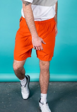 VINTAGE NIKE SPORTS SHORTS IN ORANGE WITH WHITE LOGO