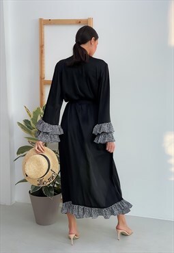 Black cover up with polka dot frills