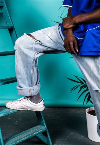 VINTAGE LEVI'S 501 JEANS IN BLUE WITH RIPS AND PAINT MARKS