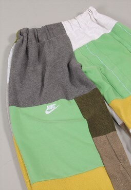 Reworked Vintage Nike Patchwork Joggers in Green Small