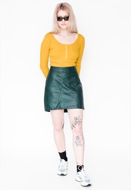 Vintage 90s faux leather mini skirt in dark green