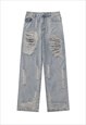 Shredded jeans grunge raver ripped denim pants in acid blue