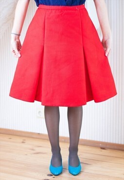 Bright red firm A line skirt with pleats