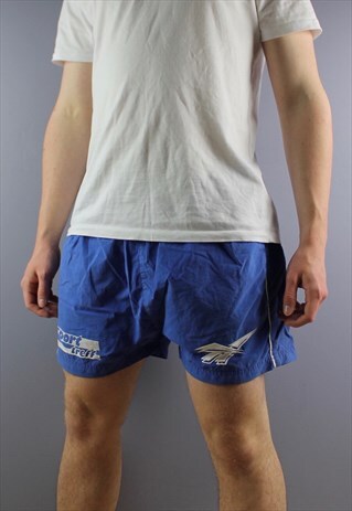 VINTAGE REEBOK SHORTS IN BLUE WITH POCKETS, EMBROIDERED LOGO