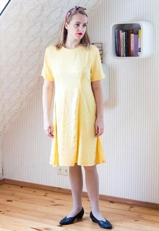Bright yellow patterned short sleeve dress