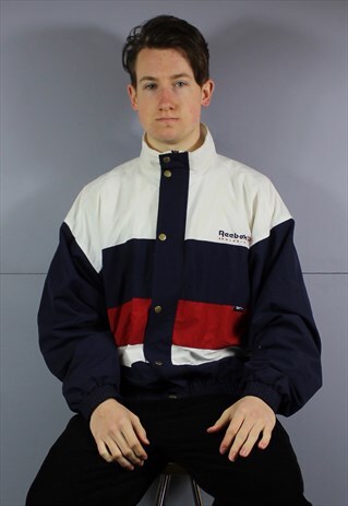 VINTAGE REEBOK WINDBREAKER JACKET IN NAVY WITH ZIP POCKETS A