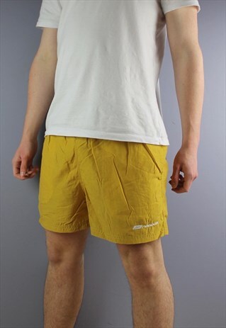 VINTAGE REEBOK SHORTS IN GOLD WITH POCKETS, A EMBROIDERED LO