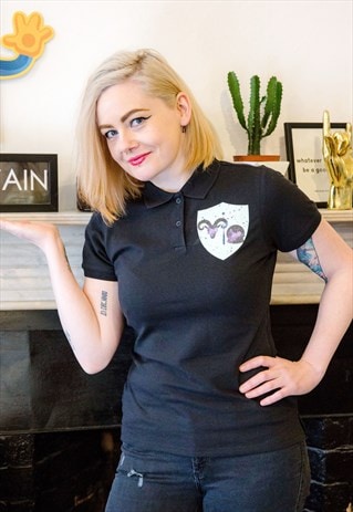 POLO SHIRT IN BLACK WITH WITCH CREST PRINT