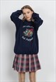 VINTAGE 80S OVERSIZED GRAPHIC SWEATSHIRT IN PURPLE UNISEX M