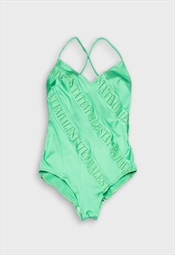 Bright green swimsuit
