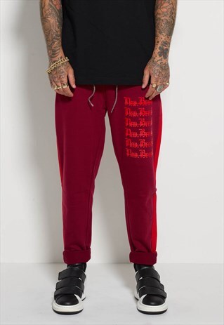 RED STRIPE STENCIL LOGO TRACK SWEAT PANTS