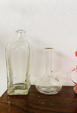 2 Vintage Textured glass bottles
