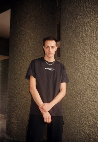 BLACK T-SHIRT WITH EMBROIDERED UK BORN, WORLDWIDE WORN LOGO