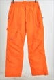 Vintage 00s skiing trousers in orange
