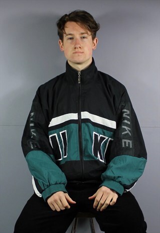 VINTAGE NIKE POLYESTER WINDBREAKER JACKET IN GREEN WITH ZIP