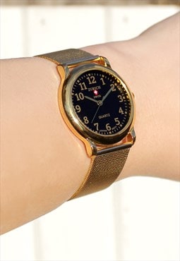 Compact Gold Watch with Gold Strap