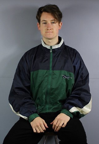 VINTAGE REEBOK WINDBREAKER JACKET IN GREEN AND NAVY BLUE WIT