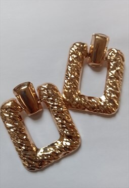 Large gold tone statement earrings 