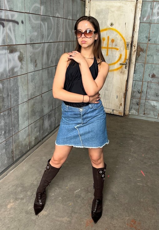 denim skirt with thigh high boots