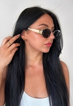 Black lens gold frame celine dupe oval sunglasses