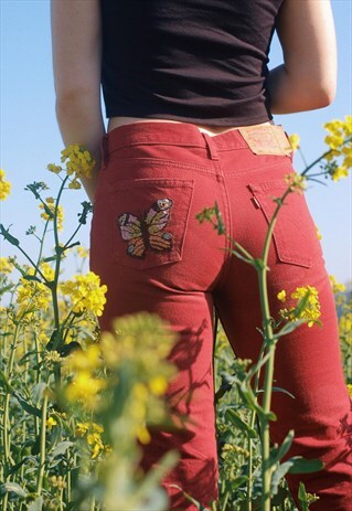 RED VINTAGE LEVIS JEANS WITH HAND EMBROIDERED BUTTERFLY
