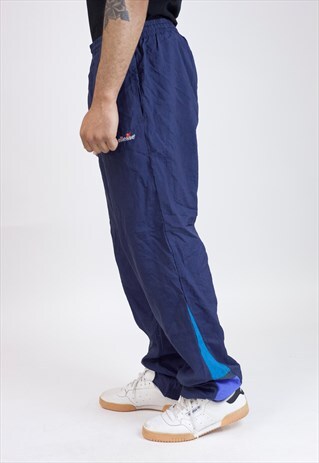 VINTAGE 90S ELLESSE NAVY SHELL TRACKSUIT BOTTOMS
