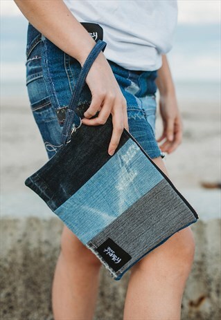 CLUTCH BAG IN PANELLED DENIM