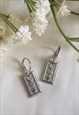 SELENE SILVER MOON AND STAR HUGGIE HOOP EARRINGS
