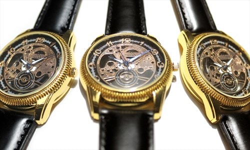 Skeleton-style gold watch