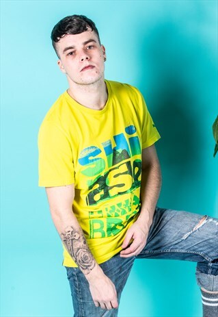 VINTAGE PUMA SPORTS T-SHIRT IN YELLOW WITH GREEN LOGO