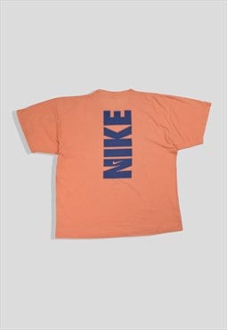 Vintage 90s Nike Spellout Logo T-Shirt in Peach Orange