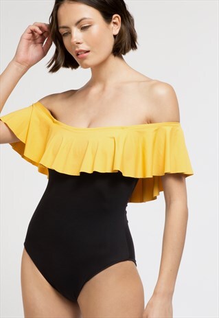 BLACK SWIMSUIT FEATURING A BARDOT NECKLINE AND A FRILL
