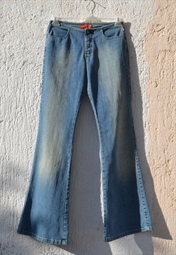 Vintage blue mid rise flared boho jeans.