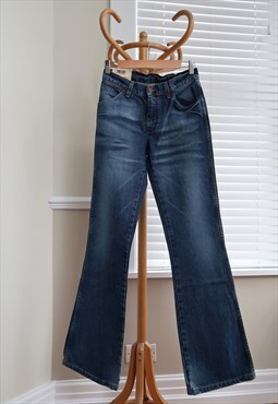 Vintage deadstock Wrangler jeans in dark blue wash.