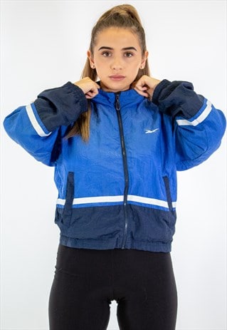 VINTAGE REEBOK CROPPED SHELL JACKET IN BLUE M/L