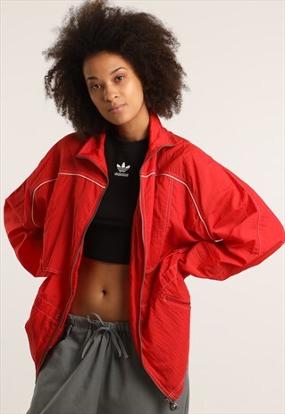 VINTAGE REEBOK EMBROIDERED LOGO LIGHTWEIGHT JACKET
