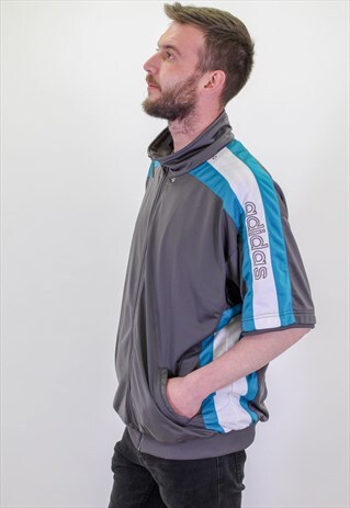 VINTAGE ADIDAS SHORT SLEEVED FESTIVAL LOGO JACKET IN GREY XL