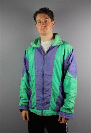 VINTAGE NYLON SHELL FESTIVAL WINDBREAKER IN GREEN/PURPLE WIT