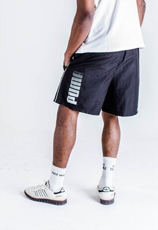 VINTAGE 90S PUMA SPORTS SHORTS IN BLACK