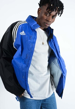VINTAGE ADIDAS WINDBREAKER JACKET IN BLUE.