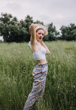 LIGHT TROUSERS WITH COLOURFUL PATTERN