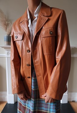Vintage tan leather jacket in 70's style in Tan.