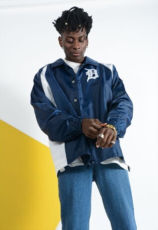 VINTAGE BASEBALL JACKET IN BLUE WITH WHITE PIPING.