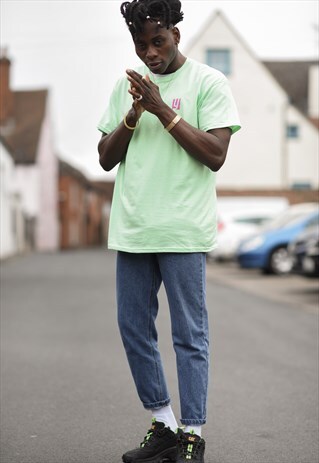 RETRO T-SHIRT IN GREEN WITH BACK PRINT.
