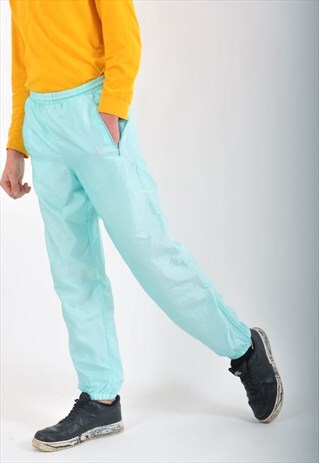 VINTAGE HEAD SHELL TRACK JOGGERS IN LIGHT GREEN