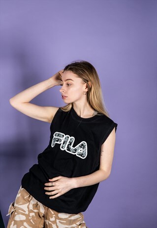 VINTAGE FILA SPORTS VEST IN BLACK WITH A GREY FLORAL LOGO