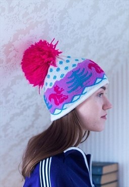 Colorful knitted hat with pom pom